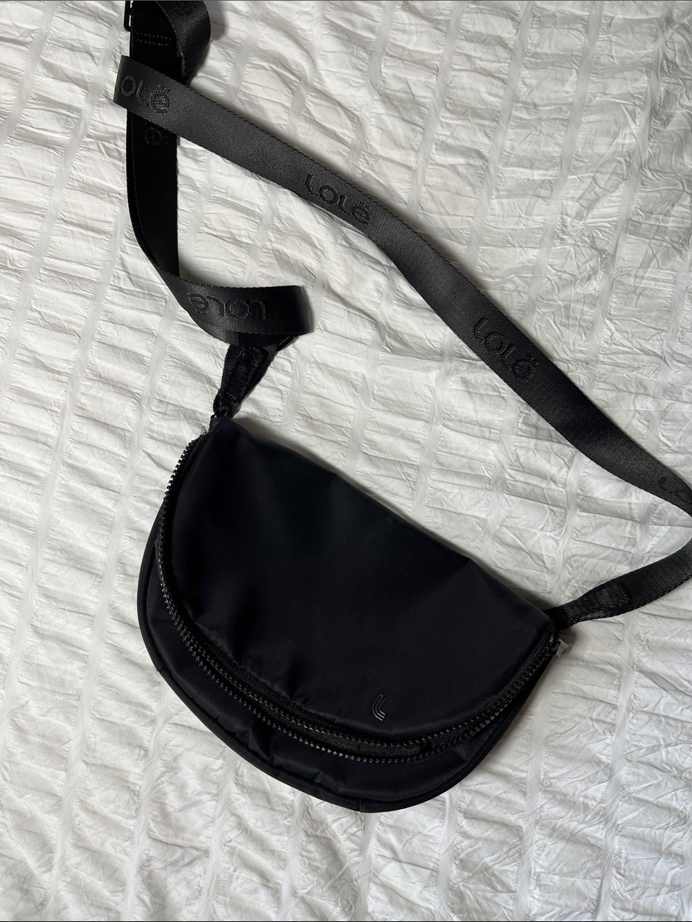 Lole fold over cross body bag